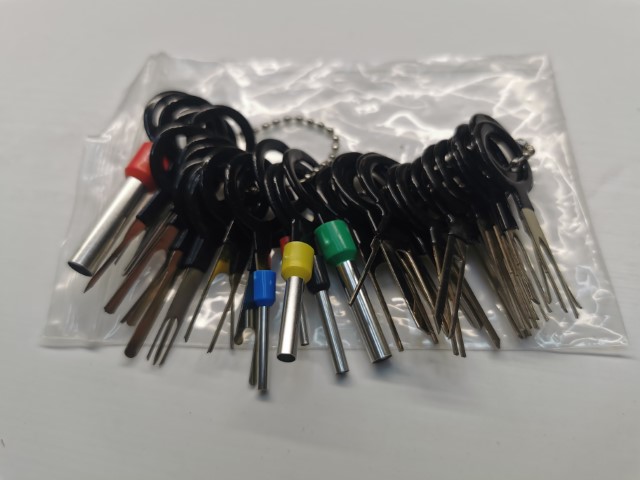 Connector terminal removal keys